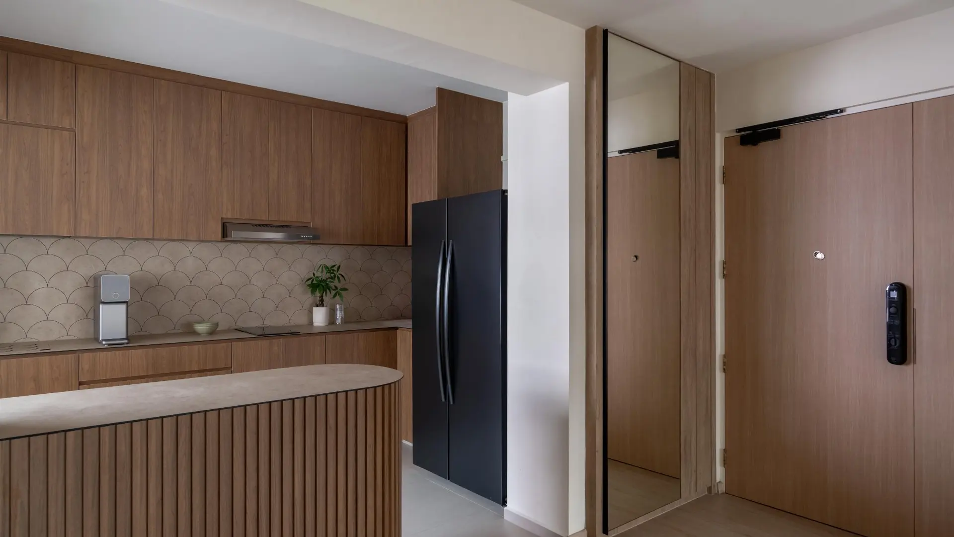 Contemporary modern open kitchen with scallop tile backsplash and fluted island in Singapore HDB by 6AM Spaces
